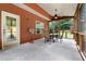 Relaxing screened porch with outdoor seating, perfect for enjoying the outdoors at 117 Constance Dr, Locust Grove, GA 30248