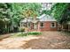 Charming brick home with symmetrical window placement and a well-maintained front yard at 1986 N Decatur Ne Rd, Atlanta, GA 30307