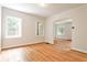Bright living room with hardwood floors and arched doorways offering an open layout at 1986 N Decatur Ne Rd, Atlanta, GA 30307