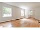 Living room bathed in natural light featuring hardwood floors, and neutral-colored walls at 1986 N Decatur Ne Rd, Atlanta, GA 30307
