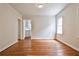 Bright living room featuring hardwood floors and access to the kitchen area at 1986 N Decatur Ne Rd, Atlanta, GA 30307