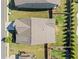 Aerial view of a well-maintained home showcasing its roof and landscaping at 410 Gardens Of Harmony Dr, Canton, GA 30115
