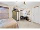 Cozy bedroom with a comfortable bed, a decorative armoire and lots of decorations at 410 Gardens Of Harmony Dr, Canton, GA 30115