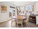 Cozy breakfast nook with a farmhouse table and chairs, perfect for casual dining at 410 Gardens Of Harmony Dr, Canton, GA 30115
