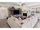 Comfortable living room with a cozy fireplace and built-in entertainment center at 410 Gardens Of Harmony Dr, Canton, GA 30115
