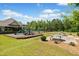 Community playground with slides and picnic tables for outdoor enjoyment at 410 Gardens Of Harmony Dr, Canton, GA 30115