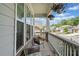 Cozy front porch with seating area, offering a relaxing outdoor space at 410 Gardens Of Harmony Dr, Canton, GA 30115