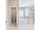 Bright bathroom featuring a separate shower and tub and tile floors at 4905 Sterling Close, Buford, GA 30518