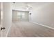 Large bedroom with carpet, a ceiling fan, and a window with blinds allowing natural light at 4905 Sterling Close, Buford, GA 30518