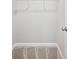 Walk-in closet with carpeted floors and wire shelving for efficient storage at 4905 Sterling Close, Buford, GA 30518