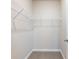 Empty walk-in closet with carpet and wire shelving providing ample storage at 4905 Sterling Close, Buford, GA 30518