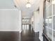 Inviting entryway boasting gleaming hardwood floors leading to the living area at 4905 Sterling Close, Buford, GA 30518