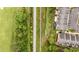 A bird's eye view shows the property bordering a golf course and a parking area, with a walkway in between at 505 Ansley Villa Dr, Atlanta, GA 30324