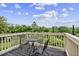 Balcony featuring iron chairs and a table with a scenic view at 505 Ansley Villa Dr, Atlanta, GA 30324