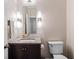 Bathroom vanity featuring granite countertops and modern lighting at 505 Ansley Villa Dr, Atlanta, GA 30324