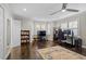 Spacious bedroom boasts hardwood floors and natural light from the multiple windows at 505 Ansley Villa Dr, Atlanta, GA 30324