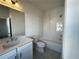 Bright bathroom with white subway tile in the shower/tub and a granite countertop on the vanity at 508 Healy Dr # 70, Cumming, GA 30040