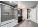 Bathroom showcasing a glass-enclosed shower and modern vanity at 115 W Peachtree Nw Pl # 713, Atlanta, GA 30313
