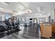 Spacious gym with fitness equipment, fireplace, and ample lighting at 115 W Peachtree Nw Pl # 713, Atlanta, GA 30313
