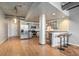 Open-concept kitchen featuring stainless steel appliances, gray cabinets, and a breakfast bar at 115 W Peachtree Nw Pl # 713, Atlanta, GA 30313