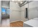 Laundry room with washer/dryer hookups, shelving, and a large window with city views at 115 W Peachtree Nw Pl # 713, Atlanta, GA 30313