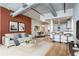 Comfortable living room featuring a modern kitchen, dining area, and stylish furnishings at 115 W Peachtree Nw Pl # 713, Atlanta, GA 30313