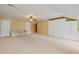 Vast bedroom featuring closet space, a couch, and neutral carpet at 11945 Dancliff Trce, Alpharetta, GA 30009