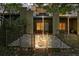 Backyard featuring stone pathway, pea gravel landscaping, and iron perimeter fence at 1323 Peachtree Ne Vw, Atlanta, GA 30319