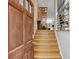 Inviting foyer featuring wood door and staircase leading to upper levels with lots of natural light at 1323 Peachtree Ne Vw, Atlanta, GA 30319