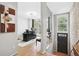 Bright and airy office space with large window, modern decor, and hardwood floors at 1323 Peachtree Ne Vw, Atlanta, GA 30319