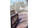 A wood deck featuring wood railings overlooking a wooded backyard at 2031 Lakewood Cir, Grayson, GA 30017