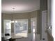 Cozy dining area with bay windows offering natural light and a view of the backyard at 2031 Lakewood Cir, Grayson, GA 30017