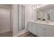 Bright bathroom with dual sinks, a large mirror, and modern vanity, ideal for a Gathering at 7 Camellia Dr, Fairburn, GA 30213