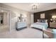 Bedroom with decorative accent wall, carpeted floors, and white trim at 7 Camellia Dr, Fairburn, GA 30213