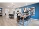 Open-concept dining area connected to a modern kitchen, perfect for seamless entertaining and Gathering gatherings at 7 Camellia Dr, Fairburn, GA 30213