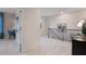 Neutral hallway with an open concept view into a bedroom and study room at 7 Camellia Dr, Fairburn, GA 30213