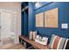 Charming mudroom featuring built-in shelving, bench seating, and stylish decor, perfect for organization and adding character at 7 Camellia Dr, Fairburn, GA 30213