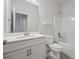 Bathroom featuring a vanity with a white countertop and a shower-tub combo at 730 Lanarck Way, Peachtree City, GA 30269