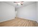 Neutral bedroom showcasing wood floors and ample natural light at 730 Lanarck Way, Peachtree City, GA 30269