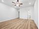 Bedroom with hardwood floors and en suite bathroom at 730 Lanarck Way, Peachtree City, GA 30269