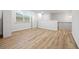 Spacious bonus room featuring wood-look flooring and natural light with built-in storage at 730 Lanarck Way, Peachtree City, GA 30269