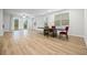 Elegant dining room featuring hardwood floors and sliding glass doors for indoor/outdoor living at 730 Lanarck Way, Peachtree City, GA 30269