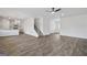 Expansive living room with luxury vinyl plank flooring, lots of light and an open floor plan to the kitchen at 748 Great Oak Pl, Villa Rica, GA 30180