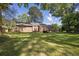 Spacious backyard with a deck, providing a perfect outdoor living space at 1111 Louise Se Ct, Conyers, GA 30013