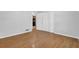 Generously sized bedroom featuring light walls, hardwood flooring, and ample natural light at 1111 Louise Se Ct, Conyers, GA 30013