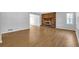 Inviting living room with new hardwood floors, neutral paint, a beautiful fireplace and plenty of natural light at 1111 Louise Se Ct, Conyers, GA 30013