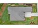 Aerial view of the home and property showcasing the lush landscaping and large driveway at 4216 Tattnall Run, Acworth, GA 30101