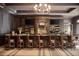Well-stocked bar with wood trim, multiple TVs, and elegant seating at 4216 Tattnall Run, Acworth, GA 30101