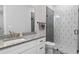 Sleek bathroom with stylish tile shower and modern vanity at 4216 Tattnall Run, Acworth, GA 30101