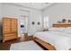 Bright bedroom features a ceiling trim, neutral color scheme, and hardwood floors at 4216 Tattnall Run, Acworth, GA 30101